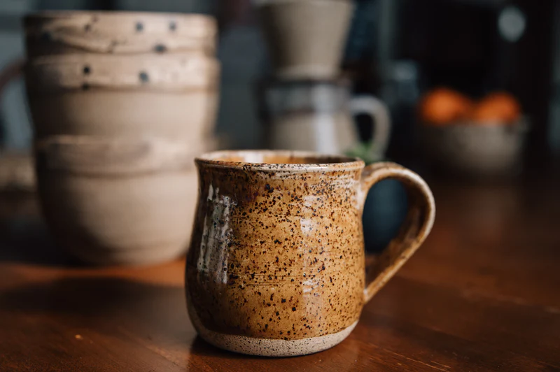 Pottery lined up in a studio